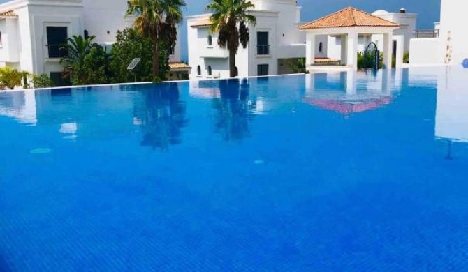 Un petit coin de paradis à Assilah+ piscine + WIFI